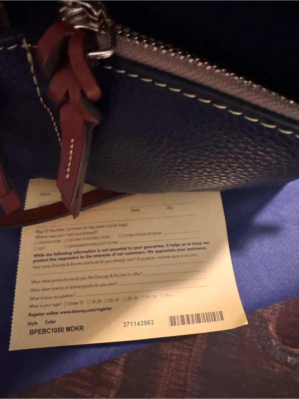 Dooney & Bourke Midnight Blue Pebble Satchel with Tan Trim